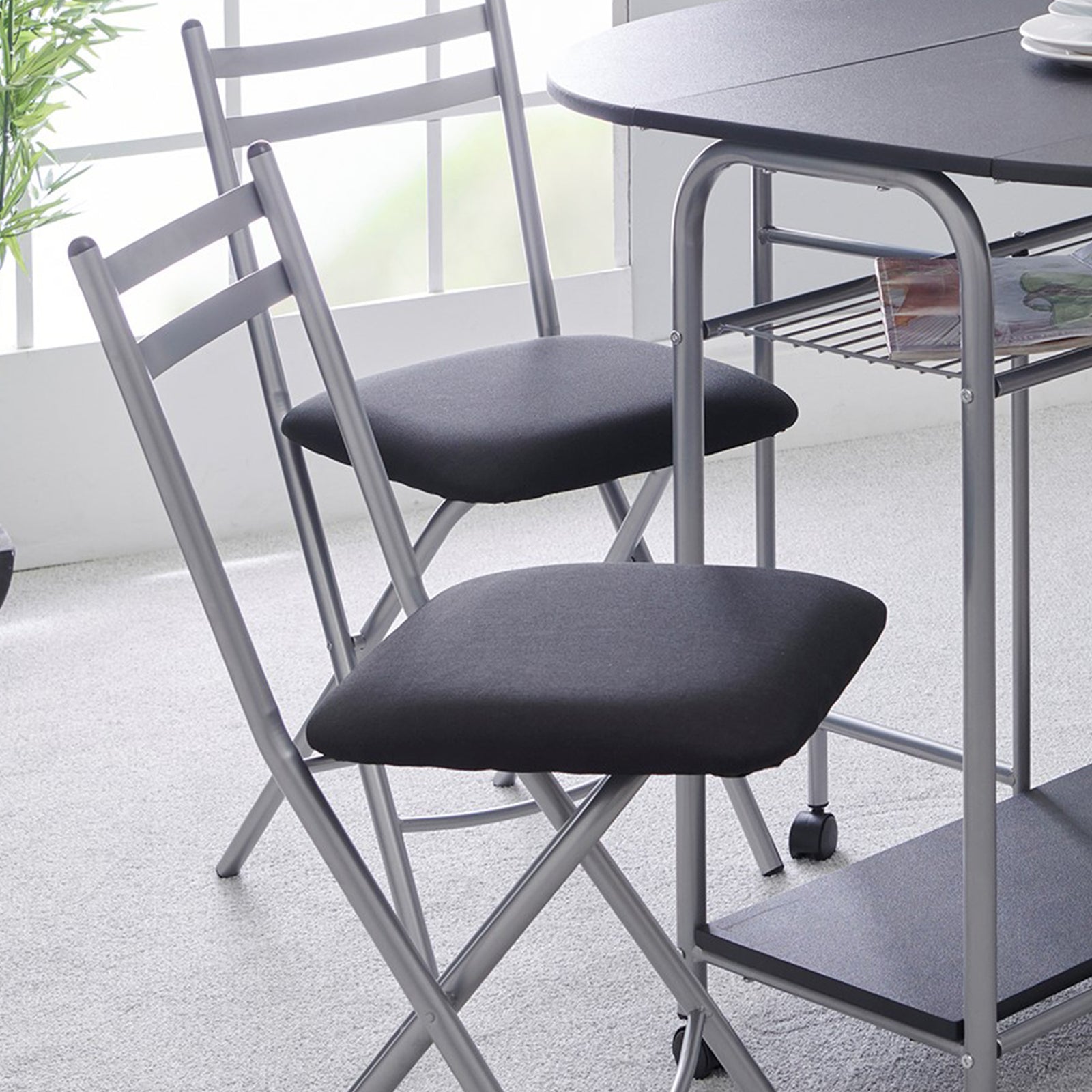 Stowaway Dining Set 4 Folding Chairs Black And Silver Compact Design