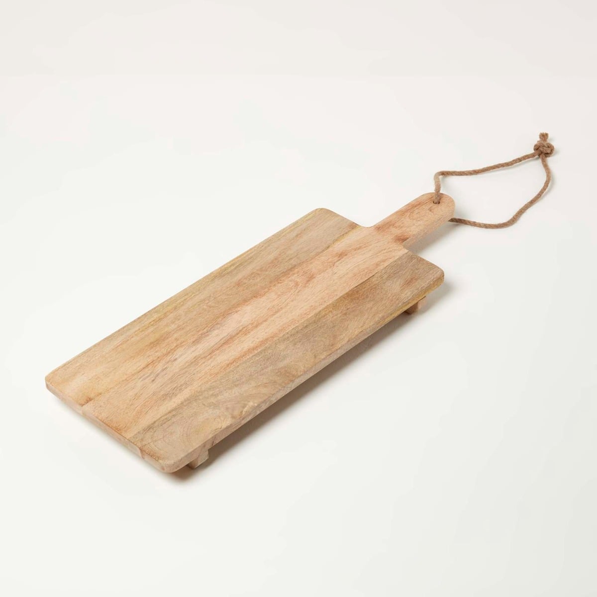 HOMESCAPES Solid Mango Wood Serving Board, 70 X 25 Cm