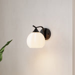 Minimalist Wall Lamp With Petal-shaped White Glass Shade And Black Iron Frame – Elegant Lighting