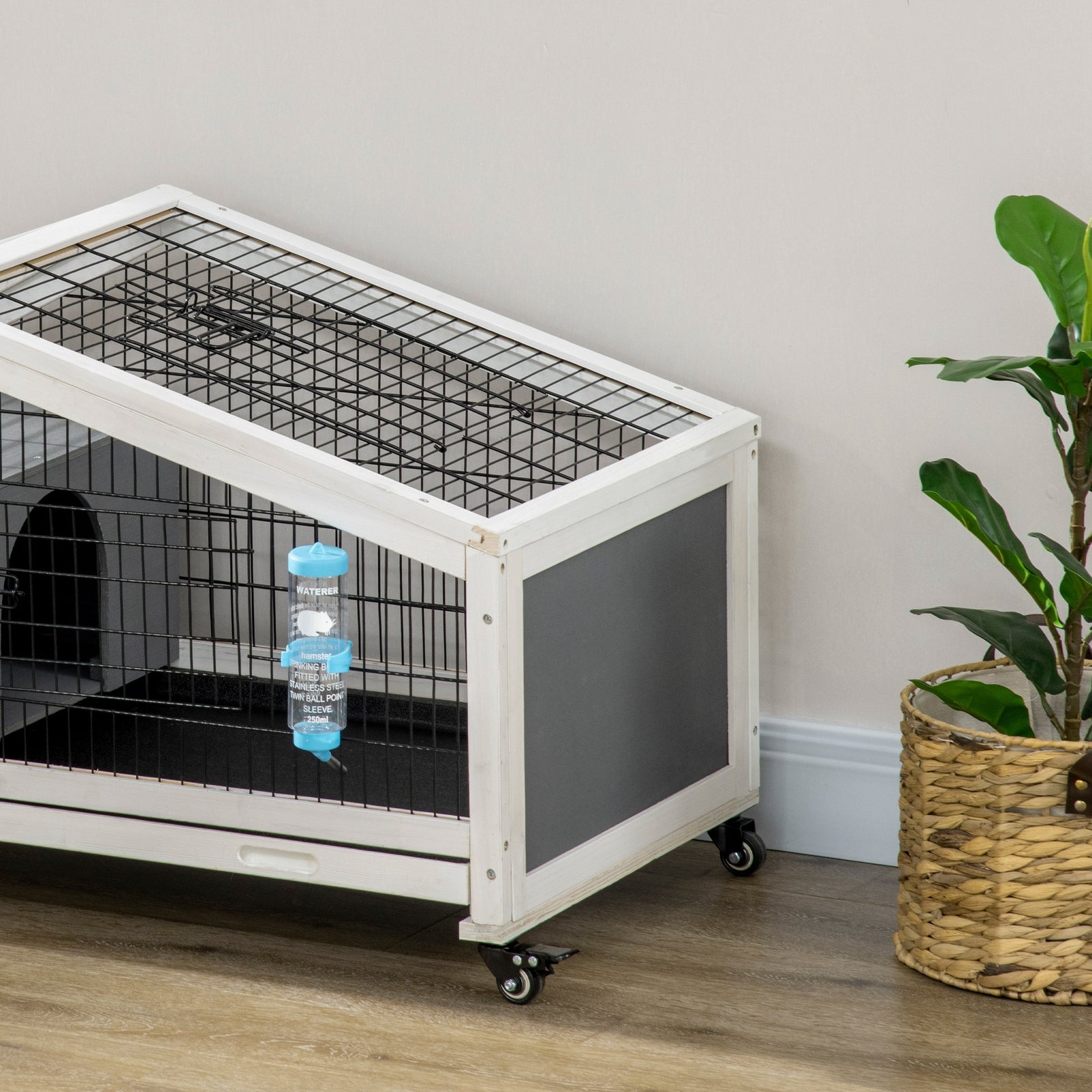 Rabbit Cage With Water Bottle, Wheels, Plastic Slide-out Tray 
Dark Grey