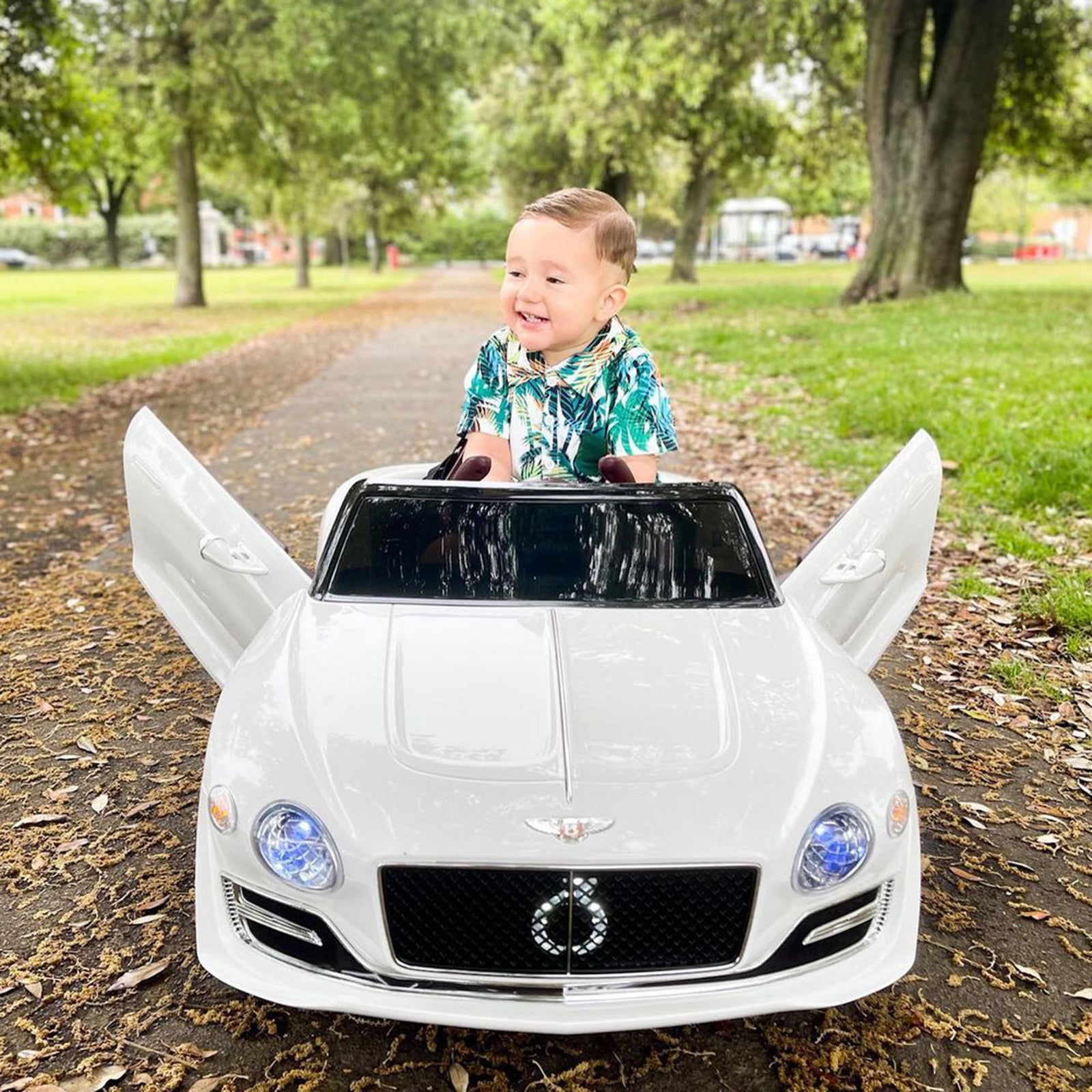 Electric Ride-on Car W/ Led Lights Music Parental Remote Control | White