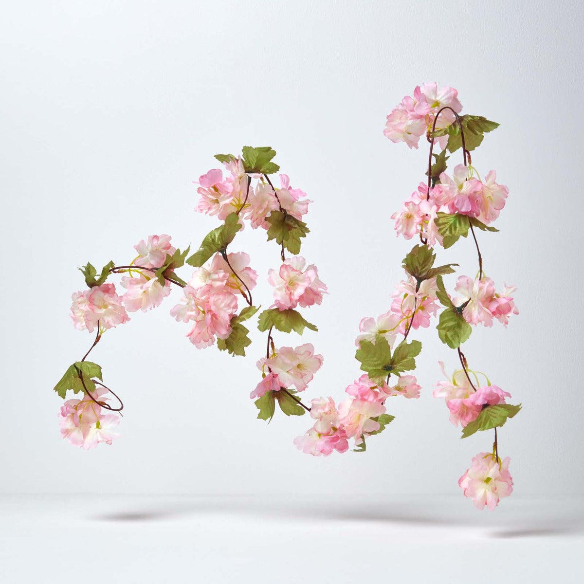 HOMESCAPES Set Of 3 Cream, Cerise & Pink Artificial Blossom Flower Garlands, 5 Ft