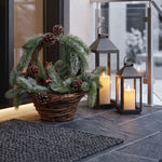HOMESCAPES Festive Wicker Basket Christmas Decoration With Green Fir, Berries And Pinecones