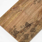 HOMESCAPES Etched Strawberry Mango Wood Chopping Board