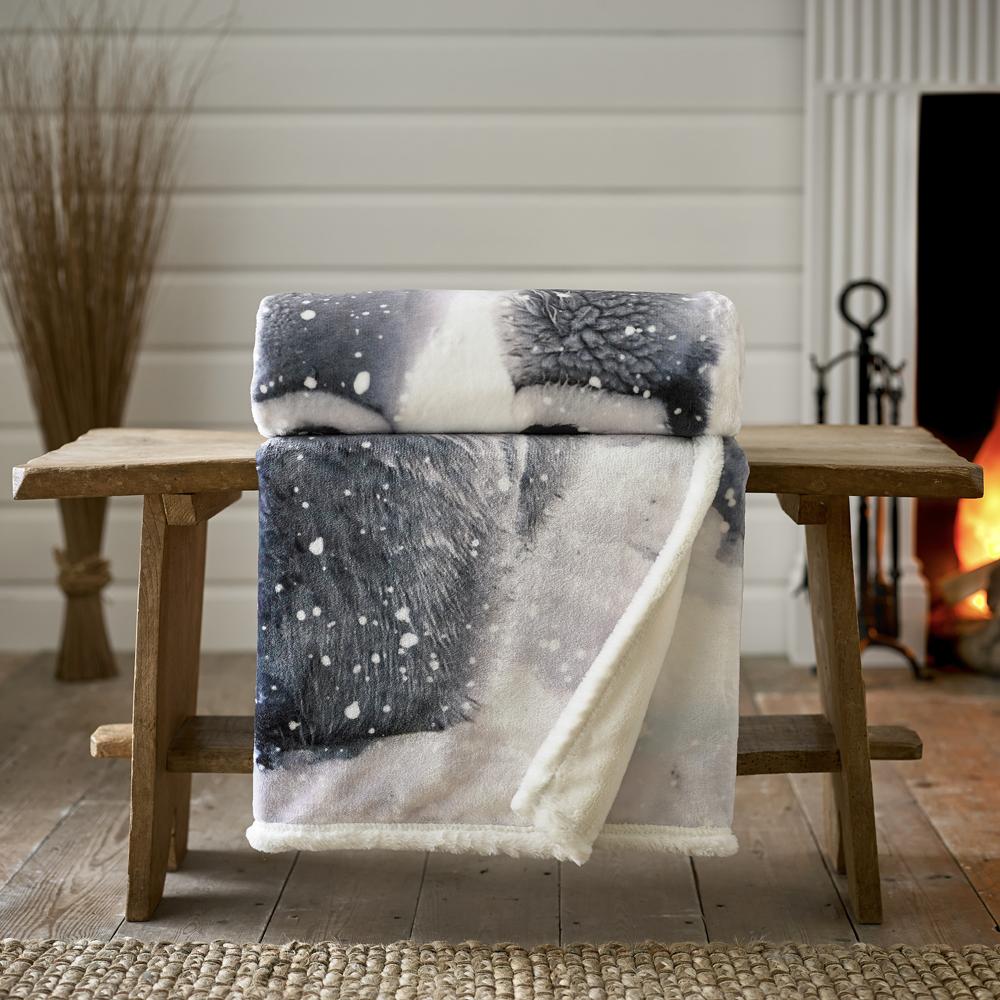 Penguin Printed Throw With Faux Fur Back