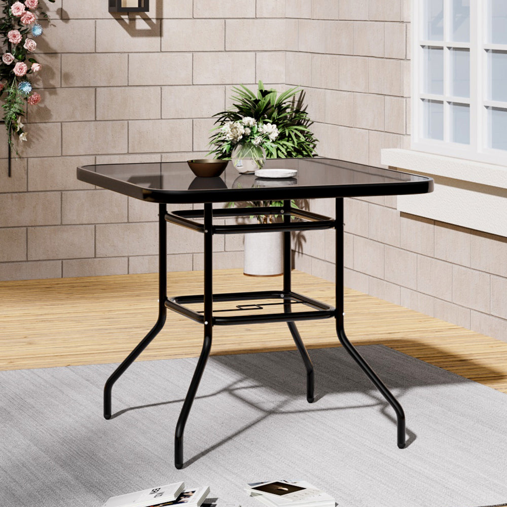 Metallic And Tempered Glass Garden Table With Parasol Hole Outdoor | Medium | Black