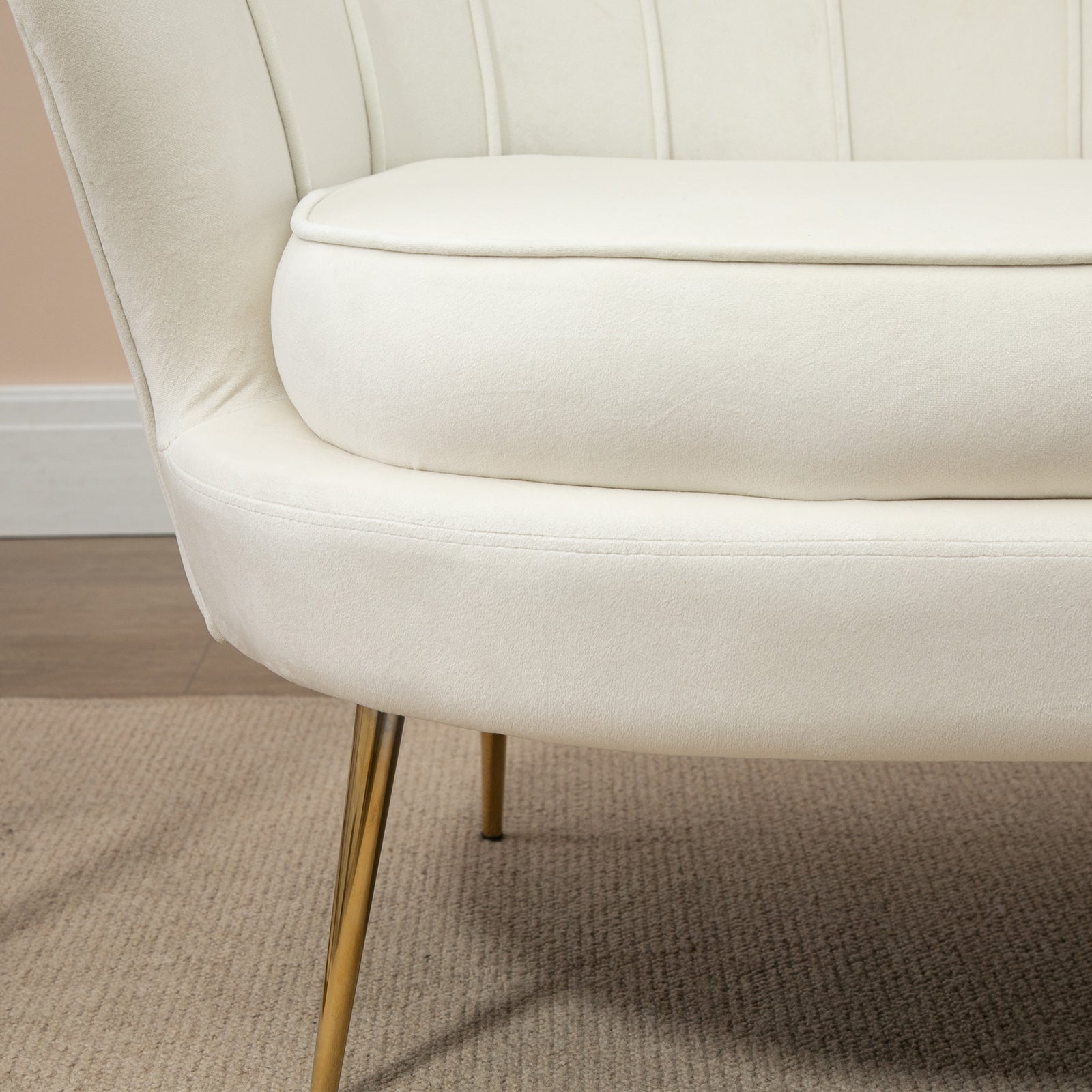 Modern 2 Seater Sofa With Petal Backrest And Steel Legs