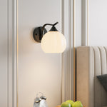 Minimalist Wall Lamp With Petal-shaped White Glass Shade And Black Iron Frame – Elegant Lighting