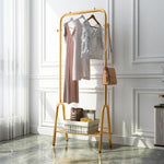 Freestanding Gold Clothes Rack With Bottom Shelf